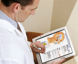 Picture of doctor filling out forms on tablet.